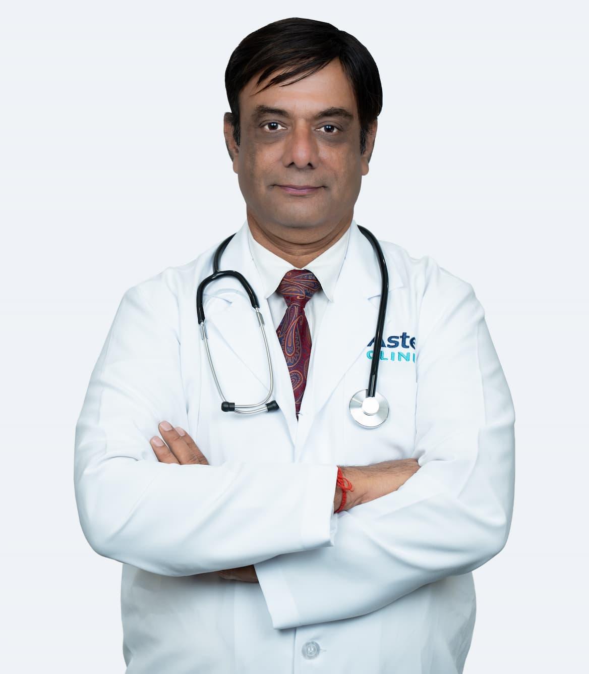 Dr. Mangesh Dande